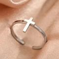 Polished silver stainless steel cross open ring on champagne silk fabric background - Silver Cross Style (F866)