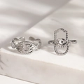 Silver Hamsa Hand and Evil Eye stainless steel rings set on white marble surface - Evil Eye/Hamsa Hand/Hammered Style / Silver 2-Piece Set (F1960)