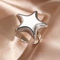 Polished silver stainless steel puffy star open ring on champagne silk background - Silver Style (N5704)