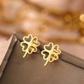 Polished hollow heart clover stud earrings in gold stainless steel on jewelry box - Gold Hollow Four Leaf Clover Style (B3683)