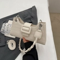 Chic beige crocodile pattern baguette bag with stylish woven strap and square buckle - White