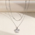 Double-layer stainless steel necklace featuring a textured flower pendant in silver finish - Silver Style (F2438)