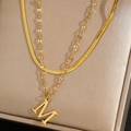 Collier double couche doré avec pendentif lettre M et chaîne plate style serpent - Lettre A / Doré
