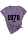 Detail of purple V-neck t-shirt featuring 1976 vintage print and stylish front knot design - Purple (Black Print)