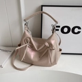 Chic pearlescent beige bucket bag with ribbon bows and lychee pattern finish - Metallic Pink
