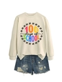 Flat lay of cream crewneck sweatshirt with 100 Days of School print and denim shorts - Sand Sweatshirt (Black Text)