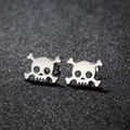 Polished stainless steel skull and crossbones stud earrings in punk style on black background - Silver Style (F1562)