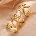 Set di anelli con stella marina e conchiglia dorati con design aperto regolabile - Collezione Oceano Oro (F633)