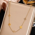 Golden stainless steel clover necklace with five alternating hollow and solid lucky charms - Gold Hollow Solid Alternating Style (F2489) / Gold