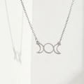 Polished stainless steel triple moon goddess pendant necklace on minimalist white background - Silver (C9402)