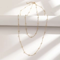 Elegante zweilagige 18K vergoldete Edelstahl Satellitenkette Halskette für Damen Schmuck - Goldfarbener Doppellagiger Perlenstil (C7011)