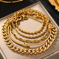 Vijfdelige gouden roestvrijstalen armbandset met gourmetketting en slangenbotlagen - Gouden Stijl (N3245)