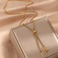 Collier ajustable en acier inoxydable doré avec pendentif cône et sphère sur soie - Pendentif Boule Cône Doré (F1421)
