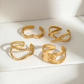 Set of four adjustable geometric gold stainless steel rings with minimalist twisted designs - Gold Geometric Four Piece Set Style (C8641)