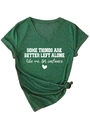 Detail of V-neck green T-shirt featuring white slogan print and side knot hem design - Vintage Green (White Print)
