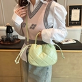Avocado green quilted bucket bag with drawstring closure and golden hardware - Green