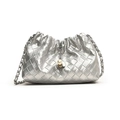 Silver woven crossbody bag with metallic finish, chain strap and pearl charm detail - Silver