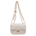 Chic cream quilted crossbody bag with gold chain strap and elegant metal twist lock - White