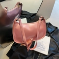 Pink glossy patent leather underarm handbag with retro half-moon shape and zipper closure - Pink