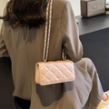 Quilted diamond chain bag in champagne pink with sleek metallic shoulder strap - Pink