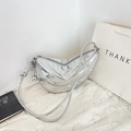 Chic metallic silver half-moon crossbody bag with crinkled texture and ball charm - Silver