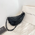 Minimalist black dumpling shoulder bag with pleated texture and silver ball pendant detail - Black