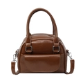 Brown vintage shell bowling bag in polished faux leather with twin handles and strap - Brown