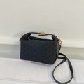 Fashionable black shoulder bag with chic textured embroidery and gold metal hardware clasp - Black