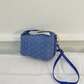 Blue denim crossbody bag with white heart patterns and gold metal buckle closure - Blue
