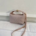 Pink textured pillow bag with 3D dots, gold metal buckle, and versatile shoulder strap - Pink