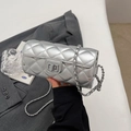 Silver quilted cylindrical chain bag with metallic finish and classic turn-lock closure - Silver
