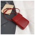 Detailansicht einer roten glänzenden minimalistischen Umhängetasche auf grauem Blazer - Rot
