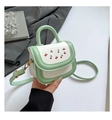 Mini handbag with green and white stitching and cherry embroidery on the front flap - Green