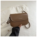 Brown leather saddle bag with silver FANYISSA logo and detachable shoulder strap - Brown