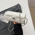 White quilted cylinder crossbody bag with silver chain strap and twist-lock closure - Off-white