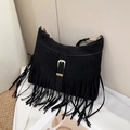 Detail of black suede tassel shoulder bag with golden metallic buckle and bohemian fringes - Black
