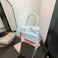 Light blue mini crossbody bag with cute bows and silver chain strap for women - Blue
