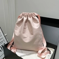 Pink drawstring backpack in light pink satin nylon finish presented in a luxury gift box - Pink