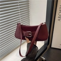 Chic burgundy baguette bag in leather and suede with a silver buckle, vintage style - Red