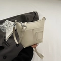 Chic cream white faux leather shoulder bag with adjustable strap and front pocket - Off White