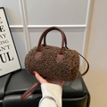 Brown faux shearling cylinder Boston bag with leather handles and long shoulder strap - Brown
