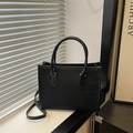 Minimalist black matte leather crossbody tote bag with embossed clover patterns - Black