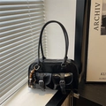 Glossy black bowling bag with silver buckle pockets and vintage beaded charm - Black
