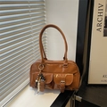 Brown patent leather bowling shoulder bag with double pockets and beaded charm detail - Brown