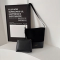 Grande set borsa a secchiello nera con tracolla regolabile e trama in pelle liscia - Nero