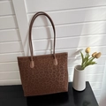 Detailed view of leopard print tote bag with leather straps and large capacity - Brown