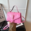 Pink crossbody handbag with woven flap and golden buckle for women's daily fashion - Pink