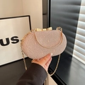 Detail of pink lace evening bag with golden metallic bow clasp and chain strap - Pink
