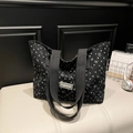 Minimalist black canvas tote bag with white heart and bow prints and fashion tag - Black