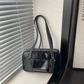 Borsa quadrata nera in pelle con cuciture bianche e tracolle eleganti di tendenza 2025 - Nero